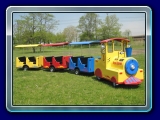 Trackless Train Ride - Enjoy the ride in the Trackless Train 12 people can ride in 3 colorful train cars.
