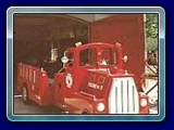 Fire Engine Train Ride - Sit back and relax in our Fire Engine Train Ride.  Hold up to 12 people in 3 colorful cars.  Electric Engine that can be used both indoor and outdoors.