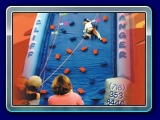 Cliff Hanger Rock Wall - 24' high - Everyone has fun trying to climb to the top.